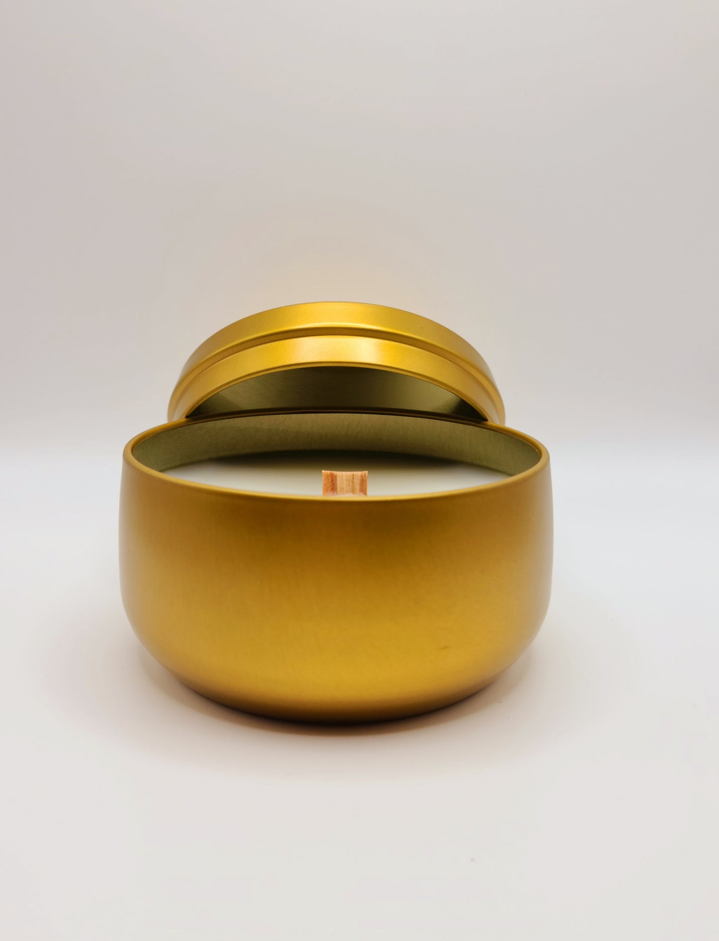 Elegant Gold 8 oz Tin Candles.