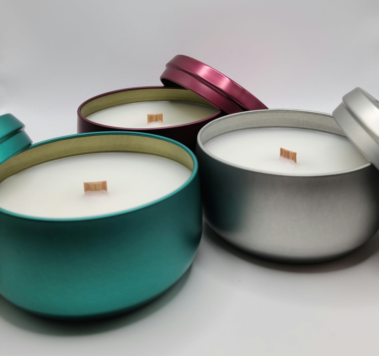 Elegant Sliver 8 oz Tin Candles.